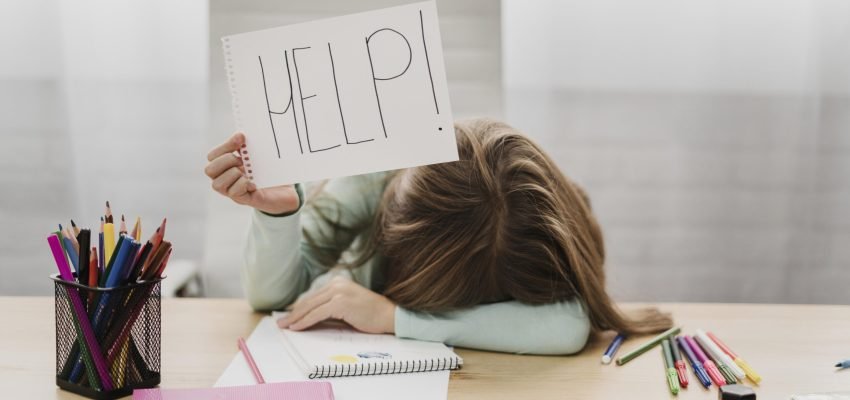 little-girl-holding-help-message-white-paper